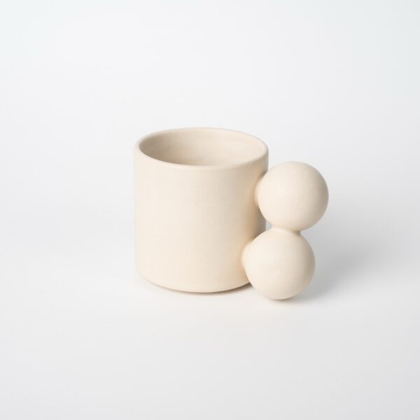 Mug with a beaded handle