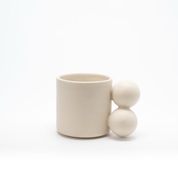 Mug with a beaded handle